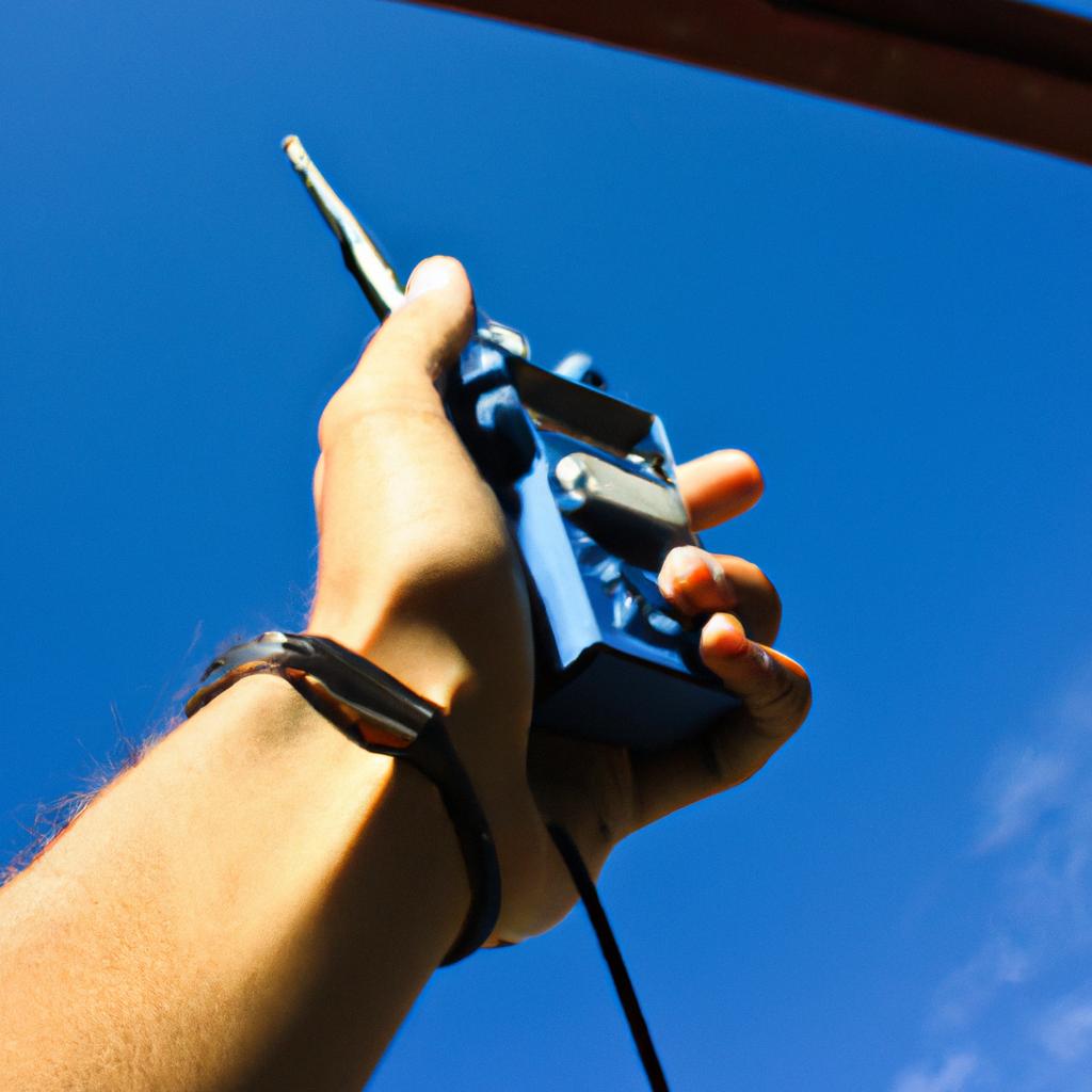 Person holding a radio transmitter